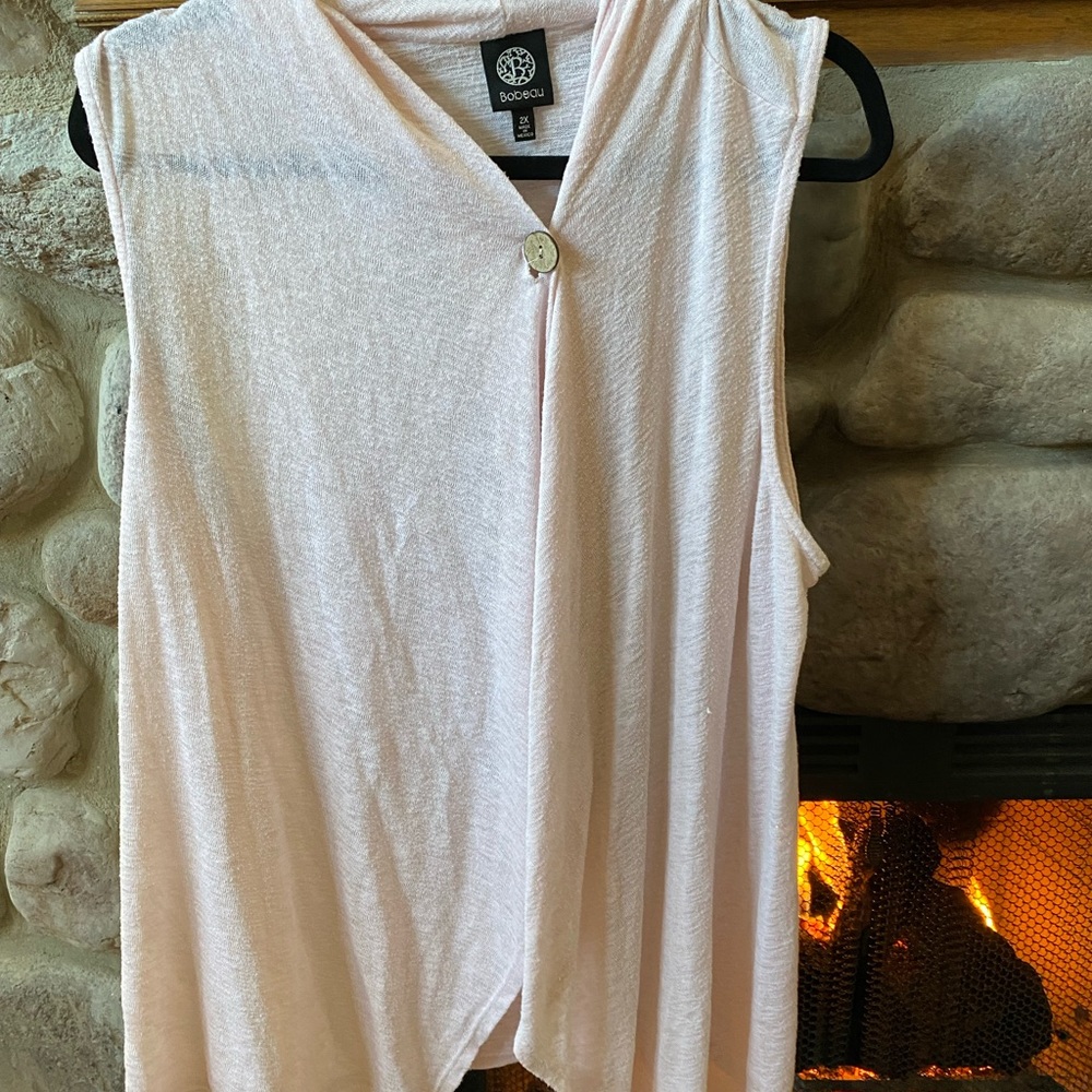 Asymmetrical layering top